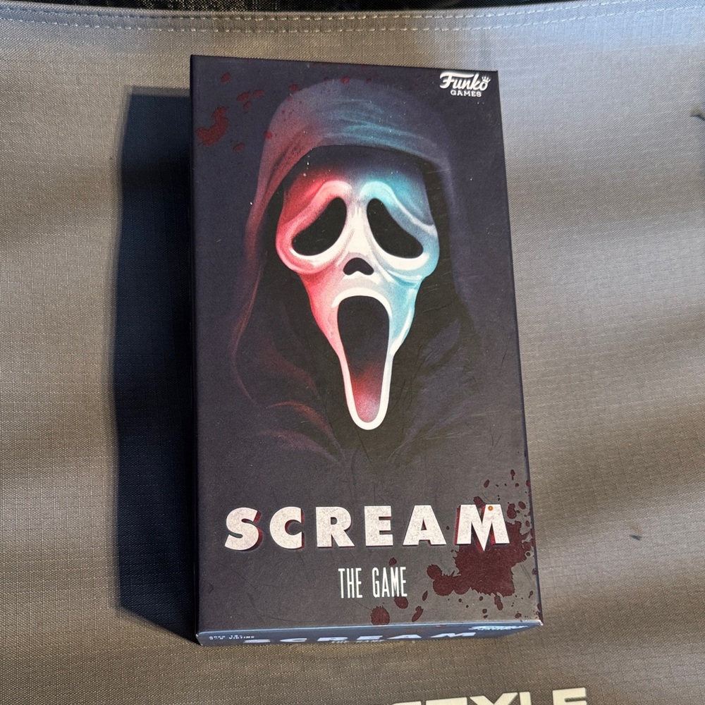 Scream: Party Game - features voice of Roger L. Jackson himself as Ghost Face.